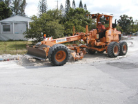 Swales being prepared for sidewalks, curbs and sod.
