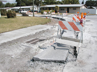 Sidewalks and curbs are poured.