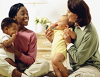 Two mothers and babies