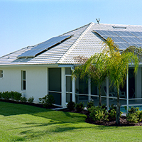 Go SOLAR Home corner view with solar panels 