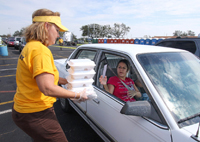 Woman Carrying Food