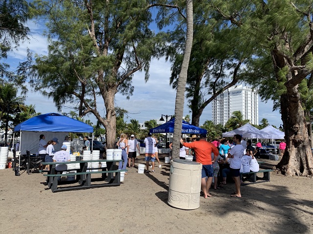 A view of some of the corporate volunteers setups on Fort Lauderdale beach.