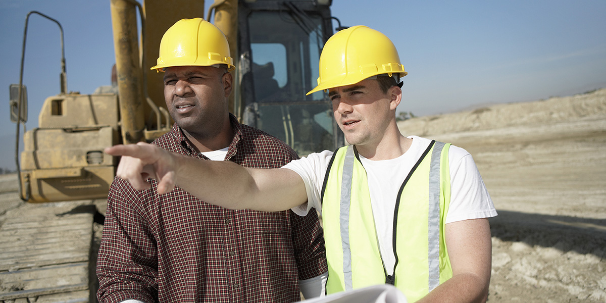 Men in hard hats on construction site