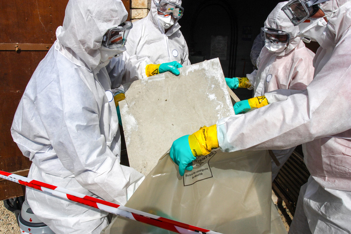Crew removing asbestos