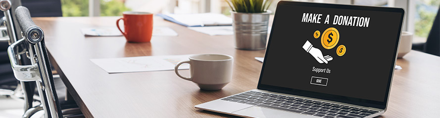 image of laptop in office ready for donation