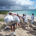 people cleaning the beaches