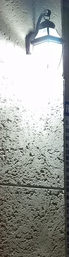 An unshielded, white light that is not turtle-friendly.