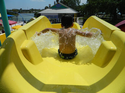 Boy going down waterslide at Castaway Island water park
